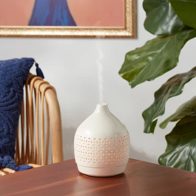 300ml Cutout Ceramic Color Changing Oil Diffuser White - Opalhouse™ 300ml Cutout Ceramic Color Changing Oil Diffuser White - Opalhouse™ -Dream Interiors Shop GUEST 118a8150 cbb4 4eed a0d3 68d9cec85ca7
